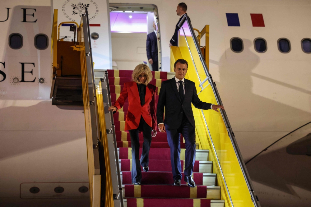 Macron's Office Minimises His Wife's Aircraft Mishap