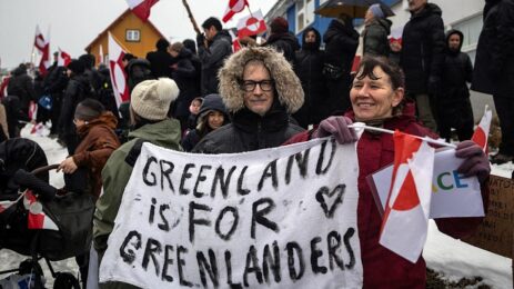 Greenland Protesters Use Bold Caps to Respond to Trump’s MAGA Message